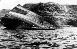 Boatmen approaching the half-sunken Darkdale