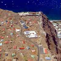 From the air (centre, white roofs)