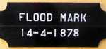 Sign on The Arch marking the 1878 Flood Level