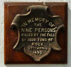 Plaque, now located outside the Library