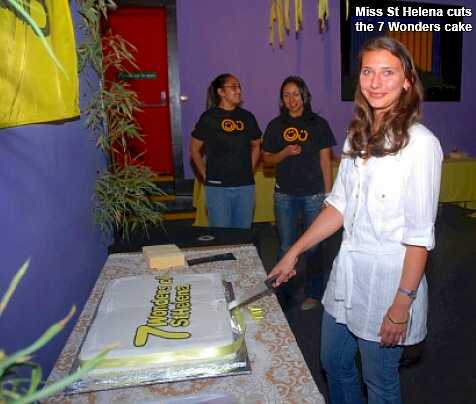 Miss St Helena cuts the Seven Wonders cake